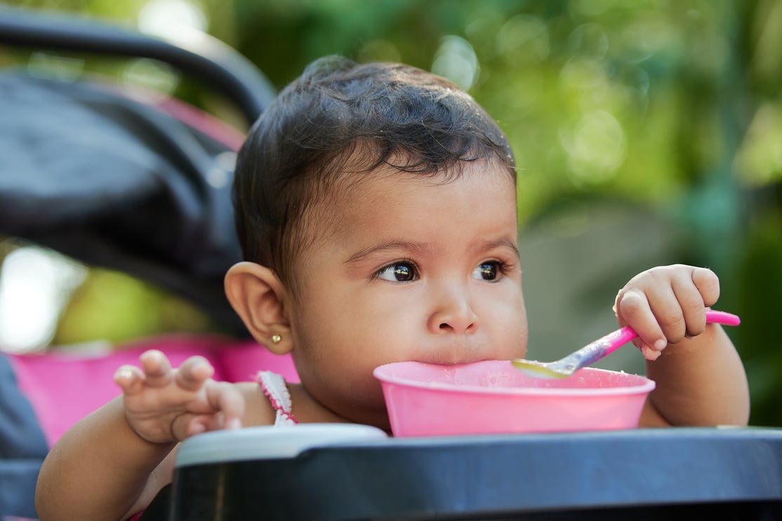 Latin baby eating